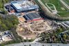 Sådan ser Kongelunden ud fra oven med ny stadionbyggeri og udgravning, hvor den tidligere Aarhus Cyklebane lå. Her skal det nye atletikstation bygges. Luftfoto: Kongelundens Sekretariat