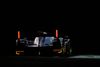 En Audi på vej ind i mørket. Ved lørdagens Le Mans kan de 177 kørere se frem til 12 timers natkørsel, hvilket er fire timer mere end normalt. Foto: Rainier Ehrhardt / Ritzau Scanpix