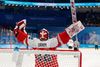 2022 Beijing Olympics - Ice Hockey - Men's Play-offs Qualifications - Denmark v Latvia - Wukesong Sports Centre, Beijing, China - February 15, 2022. Sebastian Dahm of Denmark celebrates after the match. REUTERS/David W Cerny