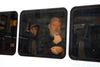 Wikileaks-stifter Julian Assange i en politivogn, efter at han blev arresteret af britisk politi. Foto: Henry Nicholls/Reuters