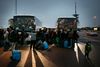 Asylansøgere sættes på en bus til Kiruna, hvor de skal bo den næste tid. Et andet sted i Sverige, Limedsforsen, nægter flere at stå af bussen i protest mod indkvarteringen.