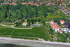 Lokalplanforslaget viser, hvordan der foreslås bygget ved siden af og bag ved Strandhuset på Rolighedsvej i midten af billedet. Visualisering: Aarhus Kommune