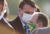 Brasiliens præsident, Jair Bolsonaro, er blevet kendt som en verdensleder, der i stor stil har taget afstand fra sundhedsmyndighedernes anbefalinger under coronakrisen. På billedet ses han sammen med Brasiliens sundhedsminister, Eduardo Pazuello, der fulgte efter Nelson Teich, der indgav sin afskedsbegæring i maj i protest mod Bolsonaros håndtering af coronakrisen. Foto: Adriano Machado/Reuters