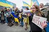 Pro-ukrainske aktivister demonstrerede mandag i Bruxelles for at få EU til at øge presset på Putin . Foto: Geert Vanden Wijngaert/AP