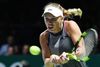 Caroline Wozniacki spillede aggressivt, da hun mandag vandt sin første kamp i kvindernes WTA-sæsonfinale i Singapore. Foto: Then Chih Wey/ZUMA Wire