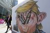 Demonstranter protesterer mod et amerikansk missilsystem, der skal opstilles i Sydkorea. Foto: Ahn Young-joon/AP