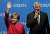 Tysklands kansler, Angela Merkel, og formanden for det bayerske konservative parti, Horst Seehofer, har i flere år været på kollisionskurs pga. flygtningespørgsmålet. Foto: Matthias Schrader/AP