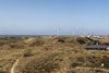 Visualisering set fra Hvide Sande: De tre møller i forgrunden er eksisterende møller. Illustration: Energistyrelsen