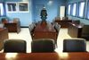 FILE - In this Dec. 22, 2011, file photo, a South Korean soldier stands on guard in a conference room at the border village of Panmunjom in the demilitarized zone (DMZ) in South Korea. With no official word, speculation heats up over where unprecedented summit between U.S. President Donald Trump and North Korean leader Kim Jong Un will be held. DMZ is a symbol of the division of Korea 70 years ago into the socialist North and the capitalist South. (AP Photo/Wally Santana, File)