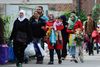 Tyskland anslår, at knap en tredjedel af alle flygtninge, der siger, de er fra Syrien, kommer fra andre lande.