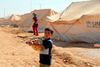 En syrisk flygtningedreng i en flytningelejr Zaatari Refugee Camp i Jordan.