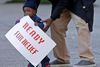 Den etårige Lavon Massey demonstrerede onsdag i New Orleans for præsident Obamas beskyttelse af illegale indvandrere. Foto: Gerald Herbert/AP.