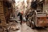 Krigen i Syrien er langt inde i sit femte år, og konsekvenserne for befolkningen har været katastrofale – som her i byen Aleppo. Nu har også Rusland meldt sig på slagmarken. Arkivfoto: AP