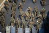 FILE PHOTO: Myanmar soldiers walk along a street during a protest against the military coup in Yangon, Myanmar, February 28, 2021. REUTERS/Stringer/File Photo