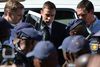 Oscar Pistorius, der her ankommer til retten i Pretoria, var et forbillede for millioner af handicappede. Nu skal han fem år i fængsel for at have skudt sin kæreste.