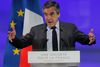 »Hvem organiserer dette? Statslige tjenester,« lyder det fra Francois Fillon. Foto: Michel Euler/AP