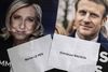 Marine Le Pen og Emmanuel Macron tørner onsdag aften sammen i tv-debat. Foto: Charly Triballeau / AFP