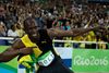 Usain Bolt fejrer Jamaicas sejr i 4 x 100-meter ved OL. Foto: Matt Slocum/AP