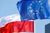FILE PHOTO: European Union and Polish flags flutter in Mazeikiai, Lithuania April 5, 2019. REUTERS/Ints Kalnins/File Photo