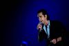 Den 60-årige Nick Cave var i sit es i Royal Arena fredag aften. Foto: Stine Tidsvilde
