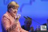 Forsbundskansler Angela Merkel står for skud im sagen om den lemfældige behandling af asylsager. Foto: Daniel Karmann/dpa via AP