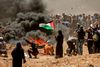 58 palæstinensere blev dræbt mandag på grænsen mellem Gaza og Israel. Foto: Mahmud Hams/AFP