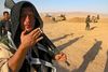 Fra pjaltehær til rigtig hær? De kurdiske peshmerga-soldater har hidtil måtte forsvare sig med gamle russiske våben, mens Islamisk Stats krigere har haft det nyeste amerikanske udstyr, som de har stjålet fra den flygtende irakiske hær. Fotos: Gunnar Willum