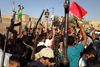 Shiamuslimer har frivilligt meldt sig til at kæmpe mod den sunnimuslimske oprørsbevægelse Isil i Irak.