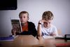 Carl-Emil (t.h.) og Viktor var færdige med dagens lektie læsning i lektiecaféen, så de hentede en bog hver på skolebiblioteket. Fotos: Thomas Emil Sørensen