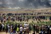 Demonstrationer og voldelige sammenstød ventes at eskalere yderligere i løbet af dagen, som er 70-års-dagen for Israels oprettelse. Foto: Mohammed Salem/Ritzau Scanpix