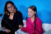 dpatop - 23 September 2019, US, New York: Climate activist Greta Thunberg (r) speaks at the United Nations Climate Change Conference. The United Nations expects more than 60 heads of state and government to present concrete, new plans to reduce CO2 emissions in short speeches lasting a maximum of three minutes. On the left is the Brazilian climate activist Paloma Costa. Photo by: Kay Nietfeld/picture-alliance/dpa/AP Images