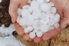 A person holds hail at Yanalla Farms in Glass House Mountains, Queensland, Australia November 17, 2019, in this image obtained from social media. Yanalla Farms/via REUTERS THIS IMAGE HAS BEEN SUPPLIED BY A THIRD PARTY. MANDATORY CREDIT.NO RESALES.NO ARCHIVES.