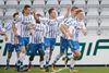 OBs Anders K. Jacobsen har scoret til 1-0 og jubler sammen med holdkammeraterne. Foto: /ritzau/Jens Dresling