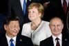 Trump mødes bilateralt med Xi (til venstre) ved topmødet for lederne af verdens vigtigste industrilande og EU. Brendan Smialowski/AFP)