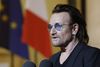 Bono med det borgerlige navn Paul David Hewson var mandag på besøg hos den franske præsident, Emmanuel Macron, i forbindelse med en turné, der i øjeblikket har bragt rockgruppen U2 til Frankrig. Foto: Michel Euler/AP