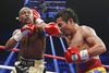 Floyd Mayweather (til venstre) vandt over Manny Pacquiao.