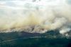 Et luftfoto over Ljusdal viser, hvor omfattende brandene er. Foto: Ritzau Scanpix/Maja Suslin