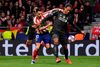 Atletico Madrid's Spanish midfielder Vitolo (L) vies with Liverpool's Dutch defender Virgil van Dijk during the UEFA Champions League, round of 16, first leg football match between Club Atletico de Madrid and Liverpool FC at the Wanda Metropolitano stadium in Madrid on February 18, 2020. (Photo by PIERRE-PHILIPPE MARCOU / AFP)