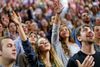 Der er højt til loftet, når de studerende på Liberty University samles til bøn. Her før et møde med den demokratiske præsidentkandidat Bernie Sanders i september. Arkivfoto: Steve Helber/AP