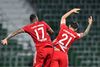 Bayern Münches Jerome Boateng og Lucas Hernandez fejrer mesterskabet efter sejren over Werder Bremen. Foto: Reuters