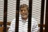 Mohamed Mursi kollapsede under et retsmøde. Foto: Tarek el-Gabbas
