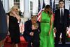 First Lady Melania Trump (2nd R), Barron Trump (R) and Tiffany Trump look on as US President Donald Trump kisses grandson Theodore James Kushner after he delivered his acceptance speech for the Republican Party nomination for reelection during the final day of the Republican National Convention at the South Lawn of the White House in Washington, DC on August 27, 2020. (Photo by Brendan Smialowski / AFP)