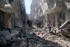 Ødelagte bygninger i marts i Aleppo efter et luftangreb fra syriske regeringstropper. Foto: Aleppo Media Center, AMC/AP