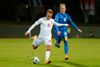Total fokus på bolden fra Christian Eriksen, der sammen med holdkammeraterne var koncentrerede nok til at besejre tamme Island. Foto: AFP