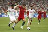 Der er kun to spillere, der har spillet flere kampe for Portugal end João Moutinho (i midten). Det er Cristiano Ronaldo med 154 landskampe og Luis Figo med 127. Foto: AP