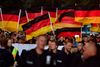 Siden en familiefar på 35 år i august blev knivdræbt i Chemnitz, har der været den ene demonstration efter den anden. Her er det en organisation på højrefløjen, "Pro Cehmnitz", som demonstrerer. Foto: John Macdougal/AFP