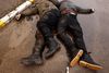 SENSITIVE MATERIAL. THIS IMAGE MAY OFFEND OR DISTURB Bodies of civilians, who according to residents were killed by Russian soldiers, lie down on the street, amid Russia's invasion on Ukraine, in Bucha, Ukraine, April 3, 2022. REUTERS/Zohra Bensemra