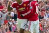Manchester Uniteds Wayne Rooney, th., og holdkammerat Memphis Depay.