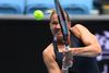 Estonia's Kaia Kanepi hits a return against Sofia Kenin of the US during their women's singles match on day four of the Australian Open tennis tournament in Melbourne on February 11, 2021. (Photo by William WEST / AFP) / - - IMAGE RESTRICTED TO EDITORIAL USE - STRICTLY NO COMMERCIAL USE - -