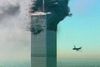 An aircraft at right about to fly into the the World Trade Center in New York in this image made from television, Tuesday Sept. 11, 2001. The aircraft was the second to fly into the tower Tuesday morning. (AP Photo/ABC) USA OUT TV OUT NO CBC